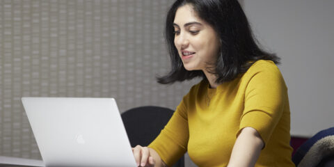Student working on a laptop computer