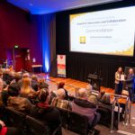 Library Board Awards 2023 - view of the stage and of Kylie Percival receiving the award.