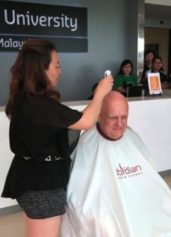 Professor Mienczakowski getting shaved for Go Bald.