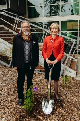 Associate Professor Simon Forrest and Vice-Chancellor Deborah Terry tree planting