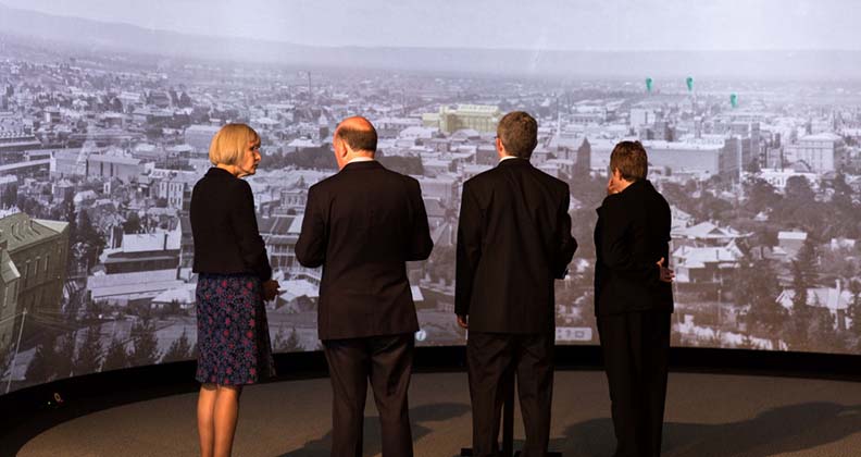 The Vice Chancellor and Minister John Day viewing the historical panoramas on the HIVE Cylinder.