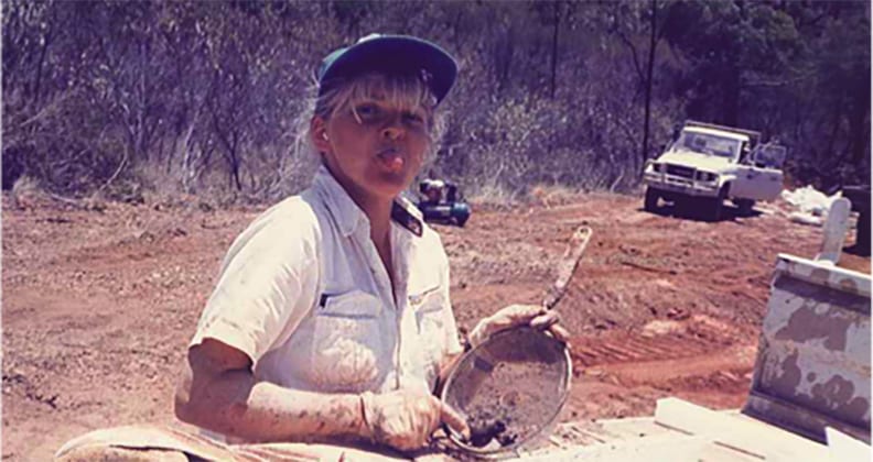 Atkins in the field as a mineral exploration geologist.