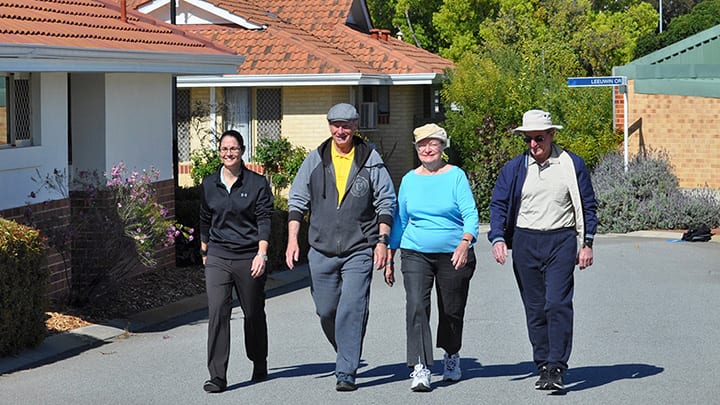 Dr Elissa Burton with participants walking
