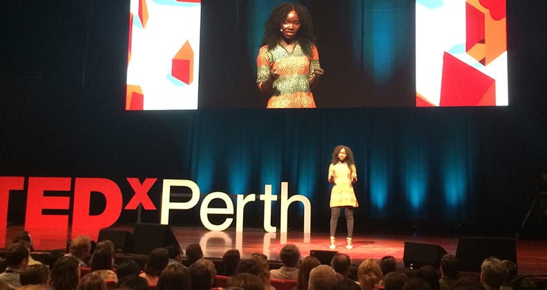 Esther Onek on stage at TEDxPerth 2017