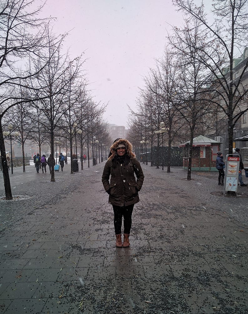 Swati with a heavy winter jacket in cold Stockholm, Sweden.
