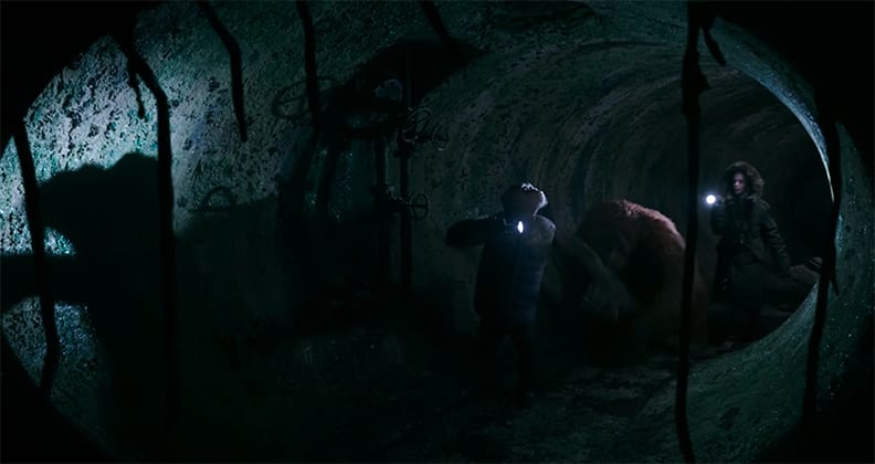 "Bad Ape", Maurice and Nova walking in a tunnel in War for the Planet of the Apes.