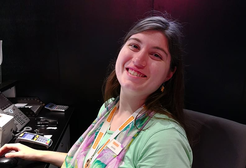 Jacinta sitting at a desk.