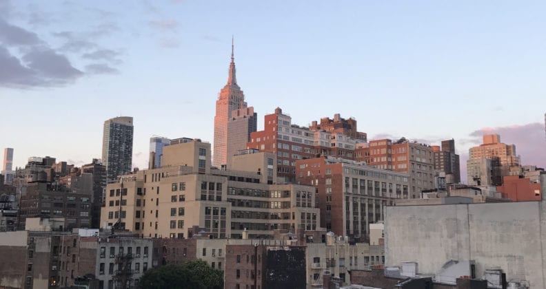 The sun sets over the Empire State Building.
