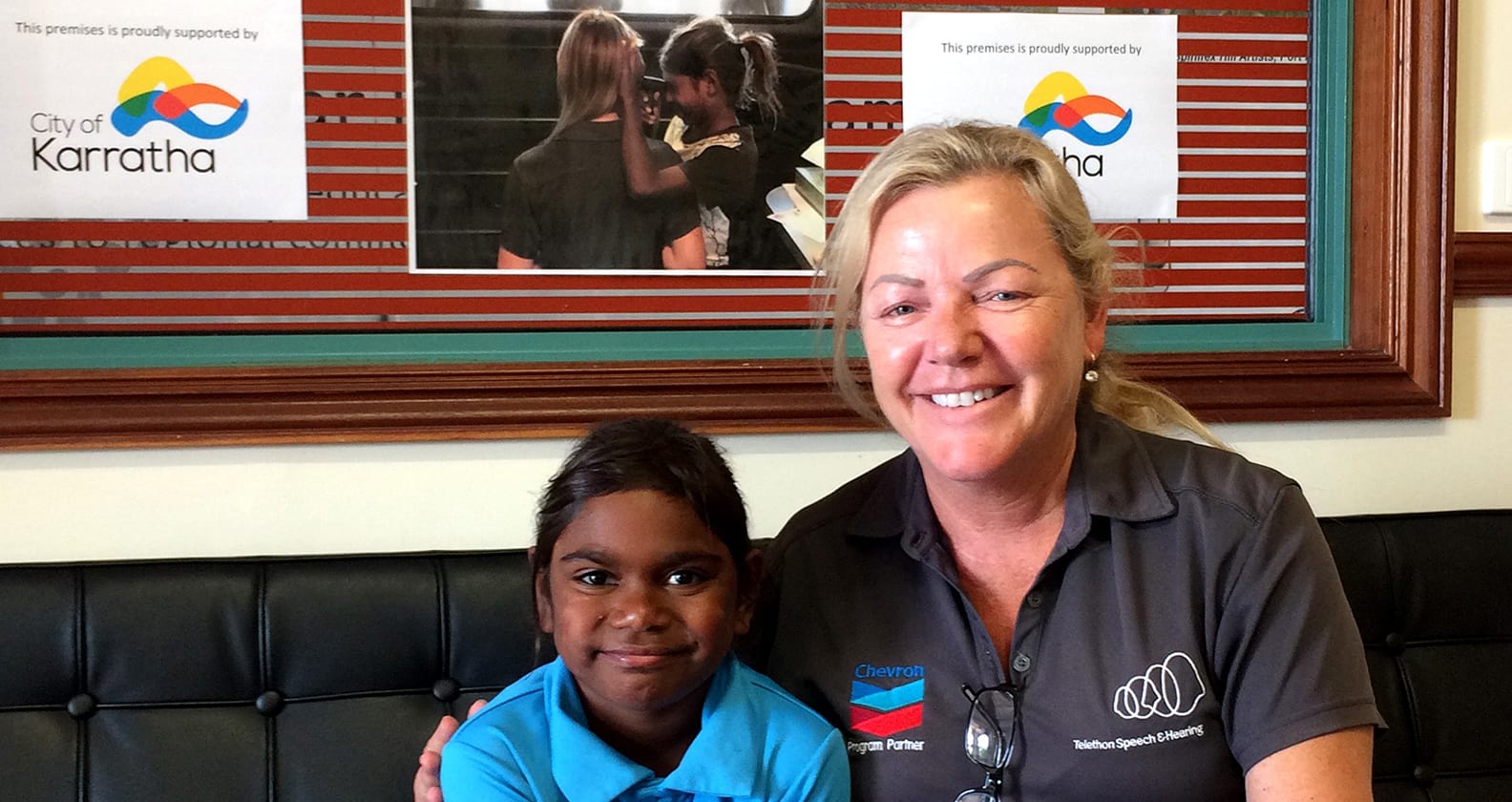 Telethon Speech & Hearing worker, with a child.