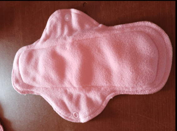 Reusable fabric sanitary pad.