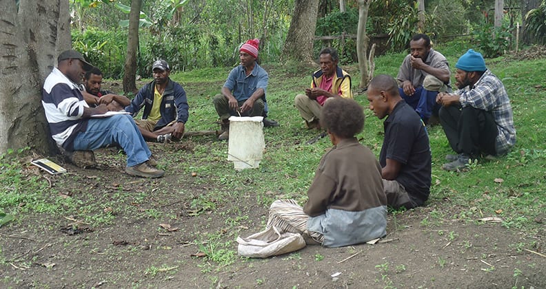 Dr Sengere (far left) holds a focus group discussion with the Korofeigu coffee grower cooperative. 