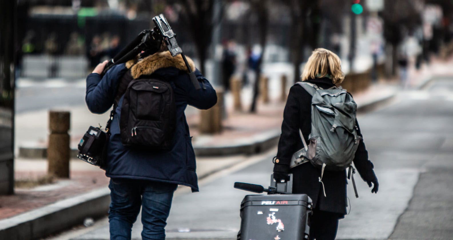 Kathryn Diss and Cameron Schwarz, walking from the Capitol Building through the streets of Washington DC on Inauguration Day.