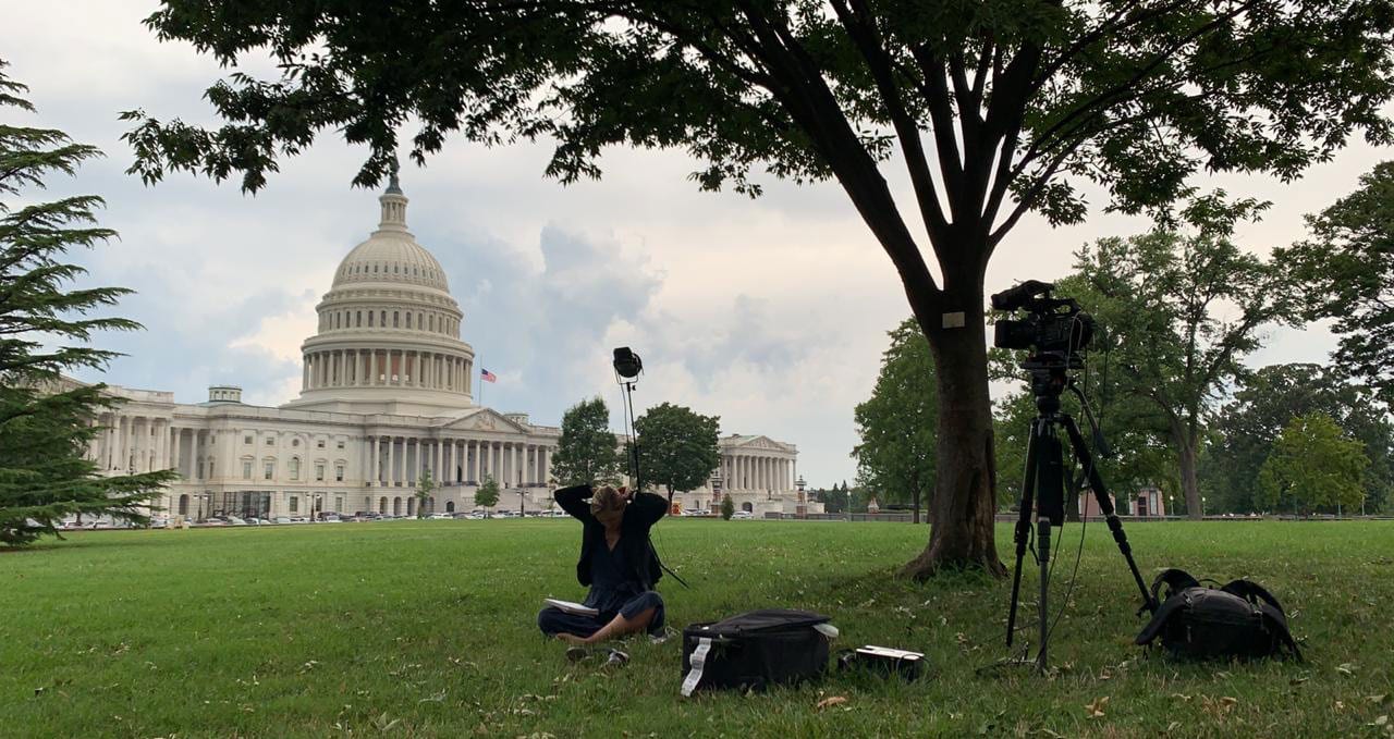 Kathryn Diss preparing for a shot outside of Capitol Building.