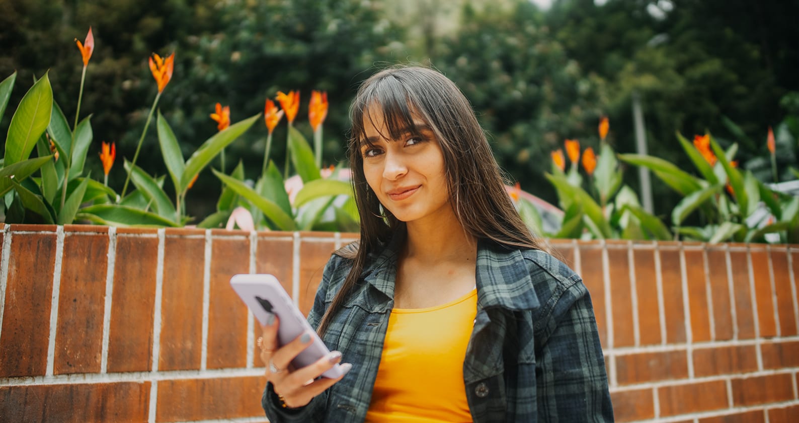 Girl smiling on mobile phone
