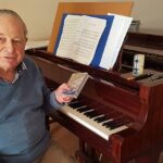 Beyond books: founding university librarian making music in his nineties
