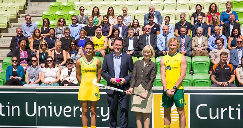 Curtin University and Hockey Australia staff and Kookaburras and Hockeyroos players at the signing