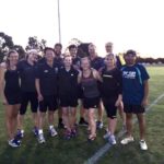Curtin take on UWA in a mixed touch rugby game