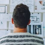 Man looking at whiteboard