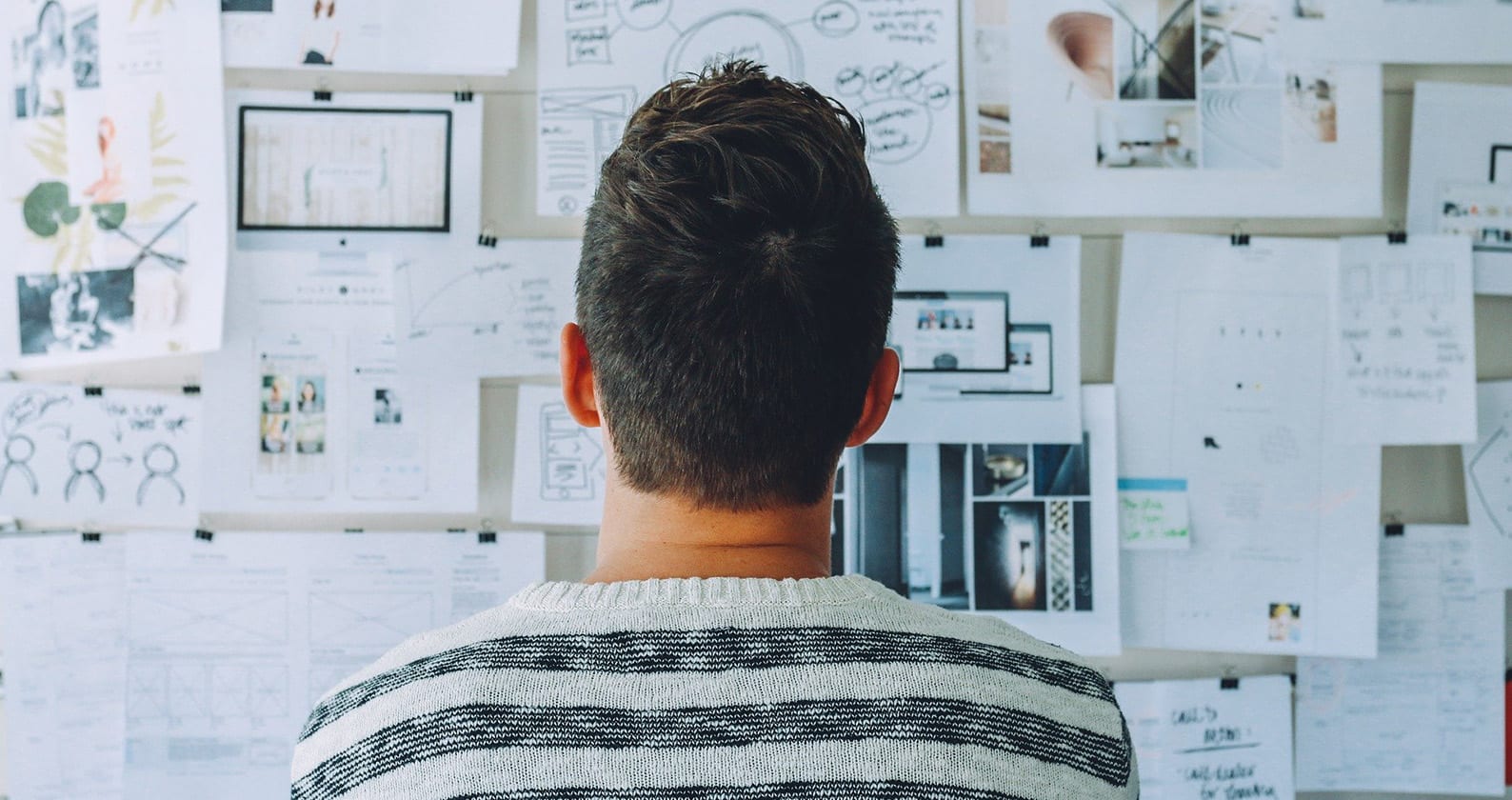 Man looking at whiteboard