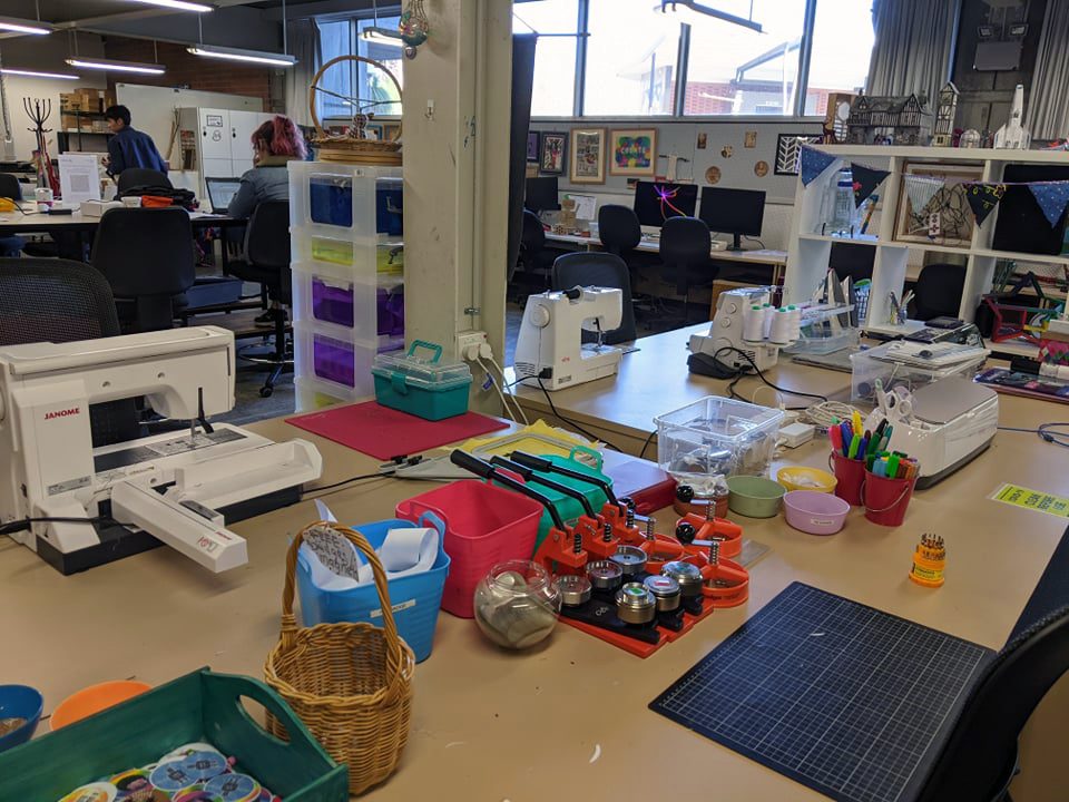 Badge maker on a table