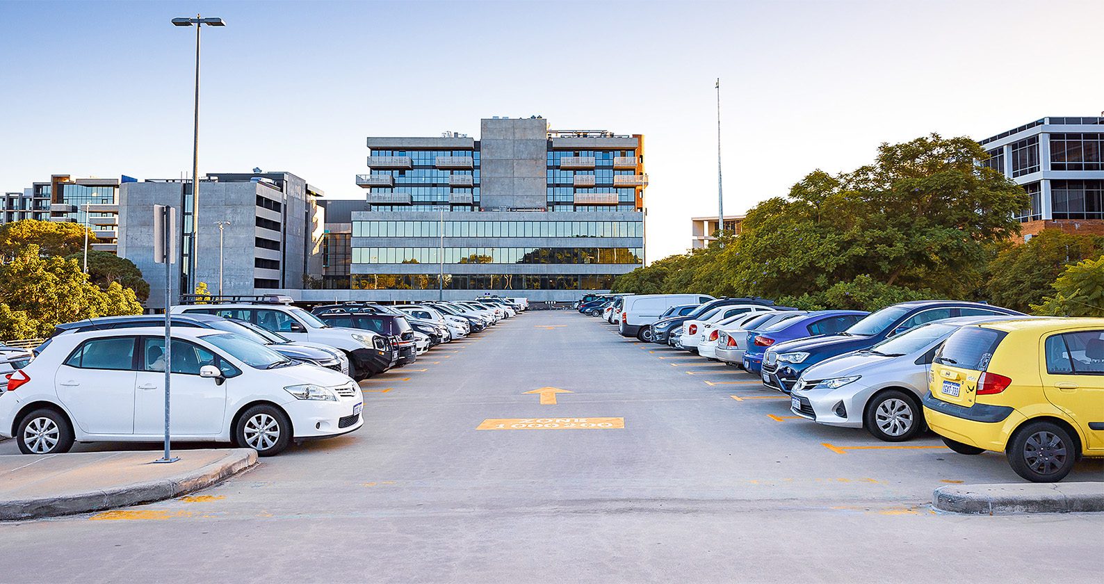 A carpark filled with parked cars on the Perth campus
