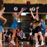 Curtin Carnabys and University of Technology Sydney verse each other in a basketball game