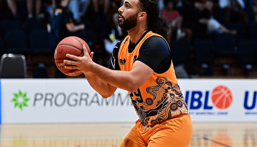 Curtin Carnbays player attempting a basketball shot.