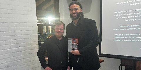 Curtin UBL player Ali Rammal with number one ticket holder Ben Johnson.