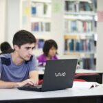 Student working on a laptop.
