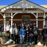 The new semester 2 2023 cohort in front of the School of Mines building