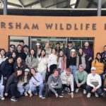 FBL International students take a group photo in front of the entrance of Caversham Wildlife park.