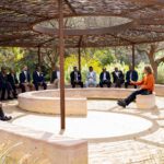 African delegates engaging in an Aboriginal cultural education session with Cultural Immersion Facilitator Elisha Jacobs-Smith, Curtin Bentley.