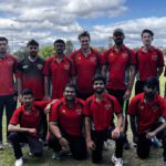 A group of Science and Engineering international students who took part at the staff vs students cricket match. They wear red shirts to represent their team.