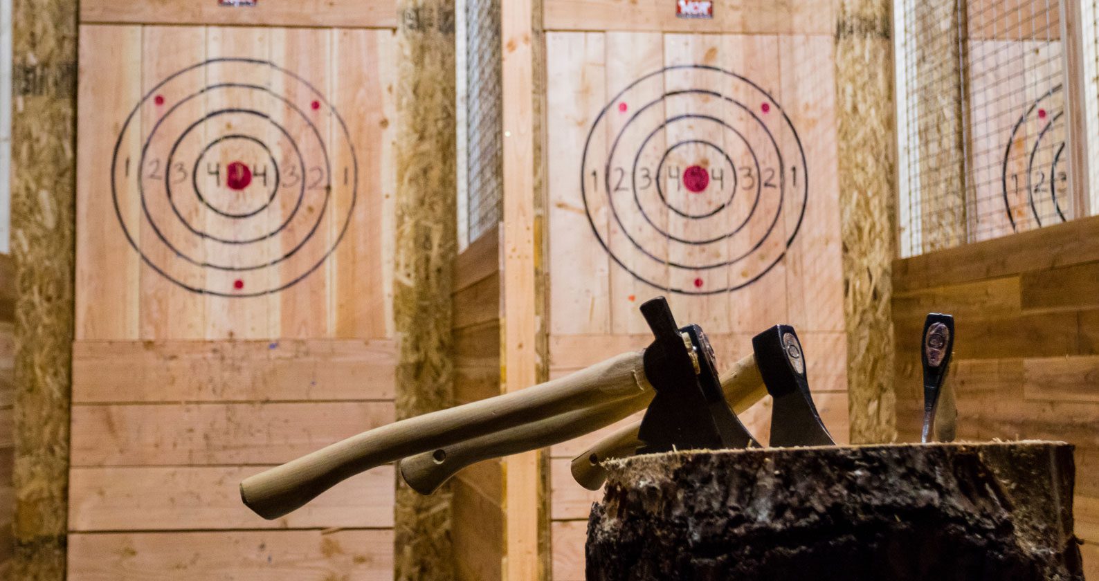 Image for International students try axe-throwing at Lumber Punks