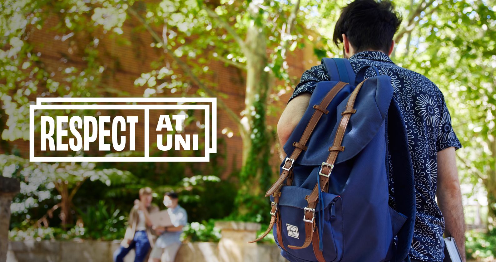 A student walking with a backpack on campus with the Respect at Uni logo.