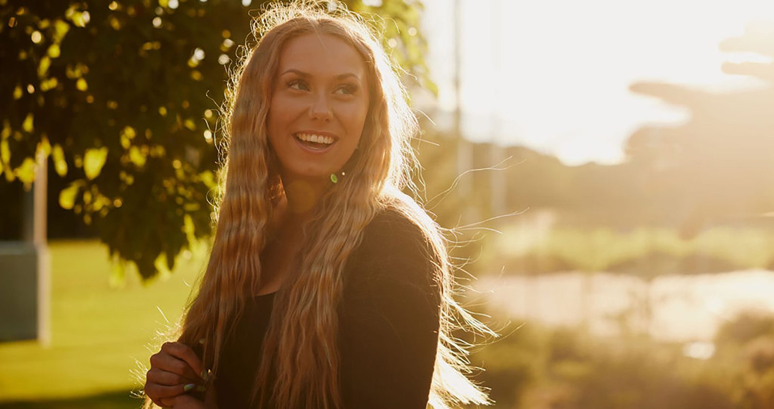 Student smiling on campus