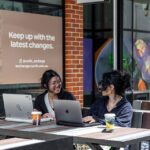 Two Curtin students chatting in the Exchange precinct