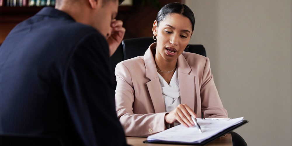 A lawyer advising a client.