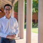 2023 Westpac Scholarship recipient Christian Bien standing outdoors on campus.