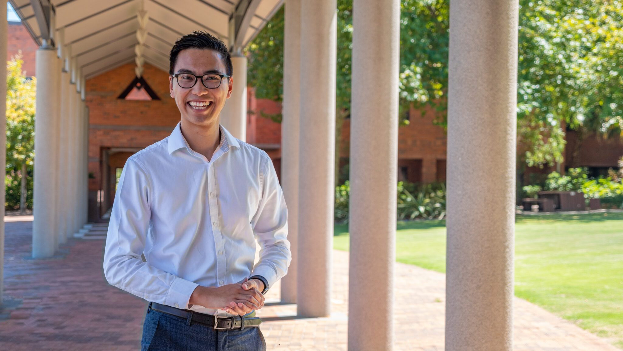 2023 Westpac Scholarship recipient Christian Bien standing outdoors on campus.