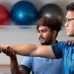 Student working with a student physio at the Curtin Bentley campus
