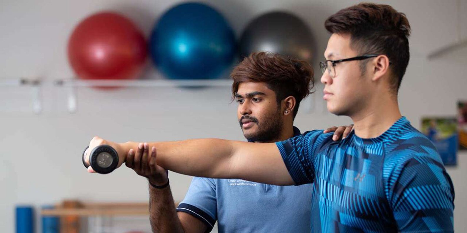 Student working with a student physio at the Curtin Bentley campus