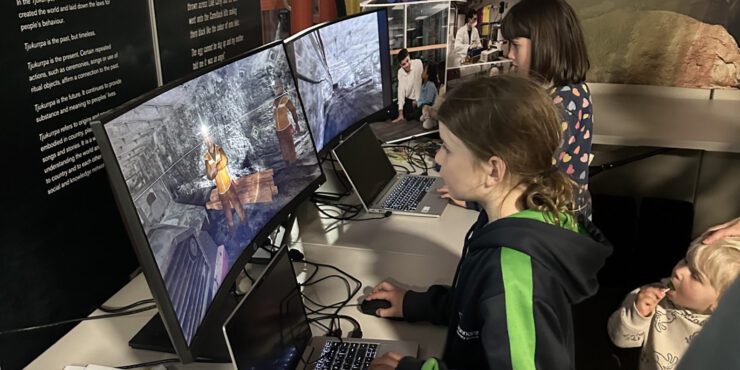 Two children using computers at Curtin Kalgoorlie.