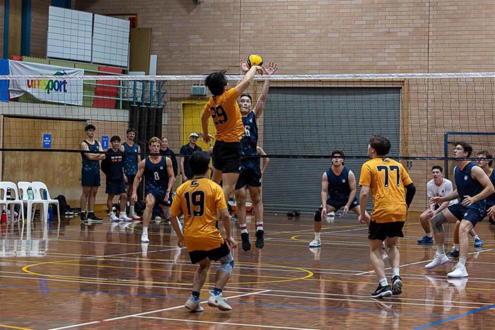 UniSport Mens Volleyball 2024 - A photo of Curtin students playing together.