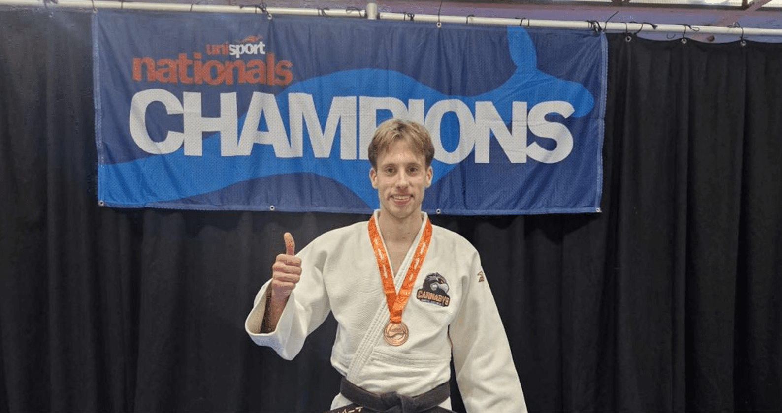 Thomas Knights winning bronze at the Uni Nationals competition.