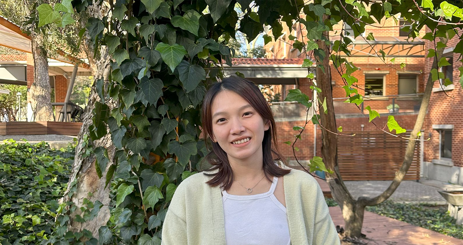 Carine Siew a Science and Engineering Student smiles on campus.