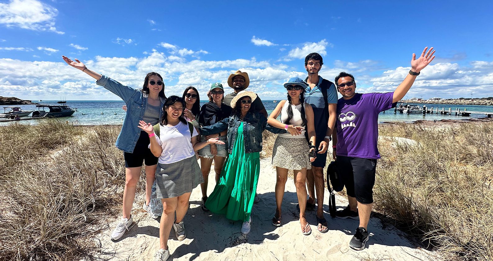 Faculty of Business and Law students smiling for a group photo at Rottnest Isalnd.