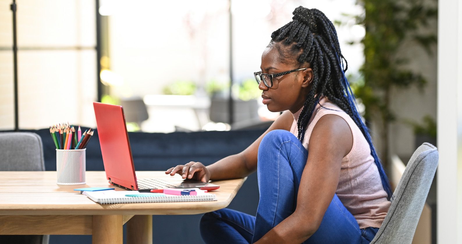 A person working on a laptop.