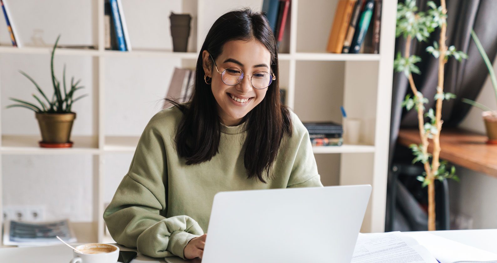 Student studying on a laptop.