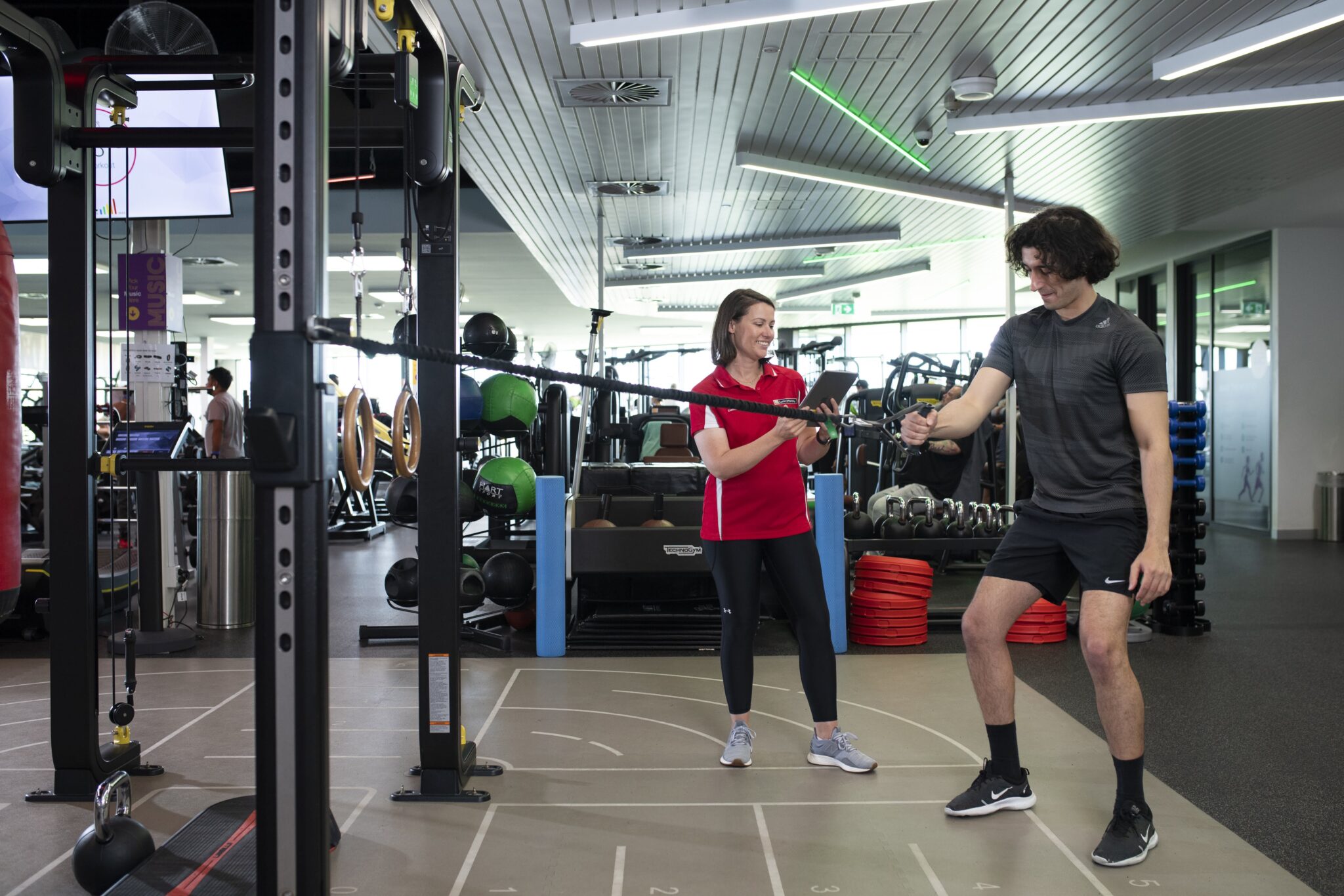 Person using equipment in gym